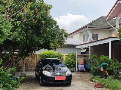 Charming suburban home with lush garden and driveway parking, perfect for family living.