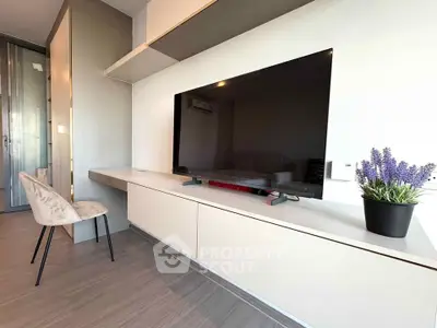 Modern living room with sleek TV setup and stylish decor