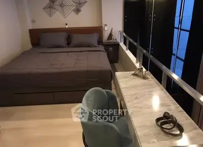 Modern bedroom with stylish decor and sleek furniture design