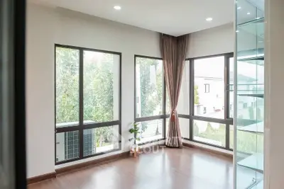 Spacious corner unit with large windows and natural light