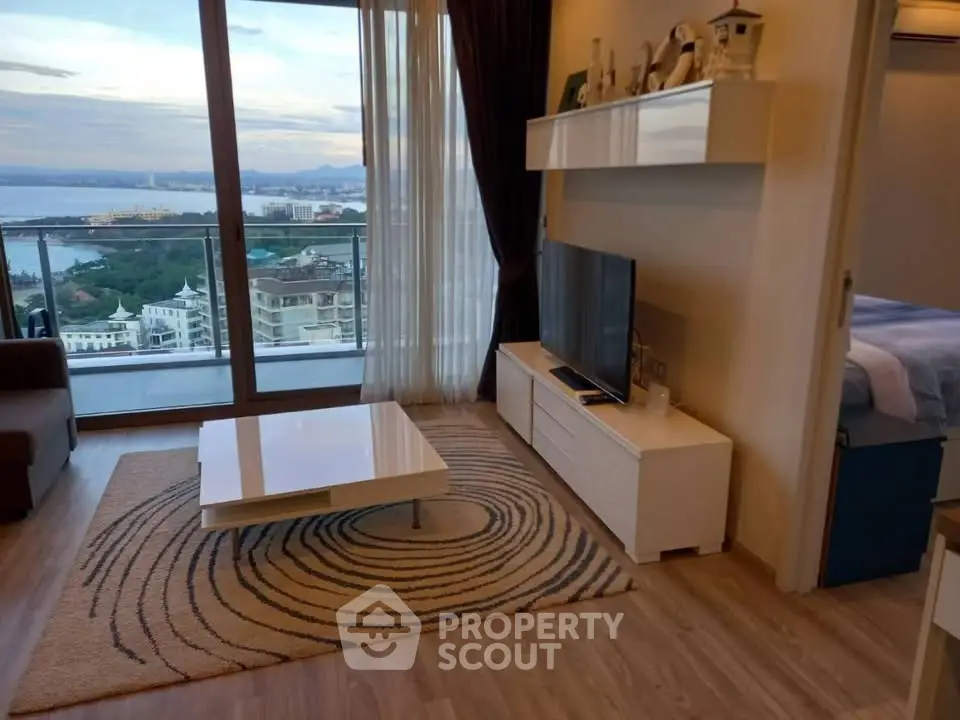 Modern living room with stunning ocean view and stylish decor