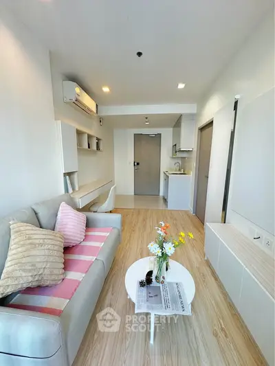 Modern living room with cozy sofa and stylish decor in a bright apartment