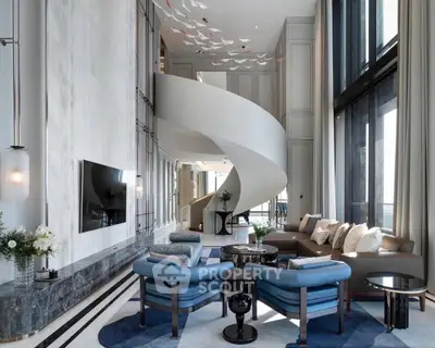 Luxurious modern living room with spiral staircase and elegant decor