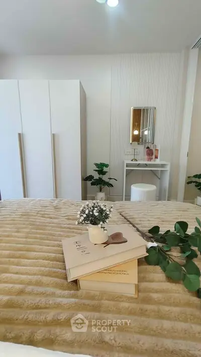 Cozy bedroom with modern decor and elegant vanity setup