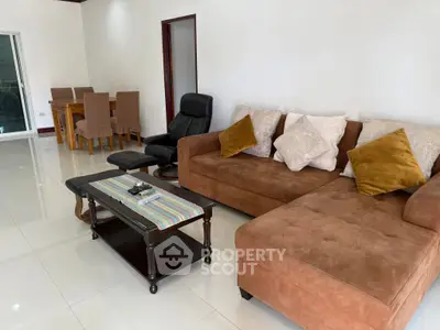 Spacious living room with modern furniture and elegant decor