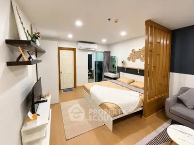 Modern studio apartment with cozy bedroom and stylish decor