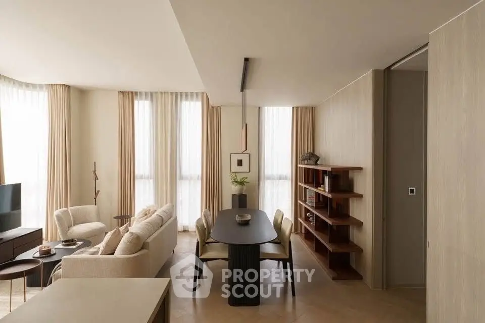 Elegant modern living room with cozy seating and stylish decor