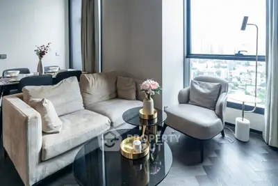 Modern living room with plush sofa and city view, perfect for urban living.
