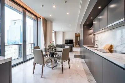 Luxurious open-plan kitchen and living area with stunning city view