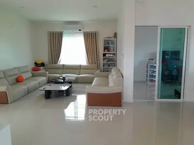 Spacious living room with modern furniture and natural light