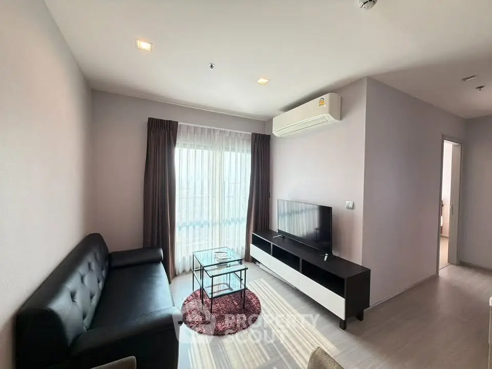 Modern living room with sleek furniture and natural light