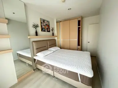 Modern bedroom with stylish decor and spacious wardrobe
