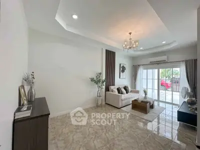 Spacious living room with elegant decor and natural light