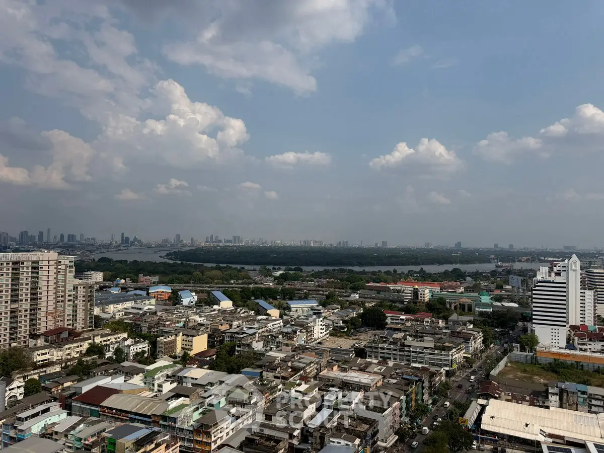 Stunning cityscape view from high-rise building showcasing urban skyline and expansive horizon.