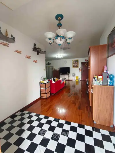 Spacious living room with wooden flooring and stylish decor