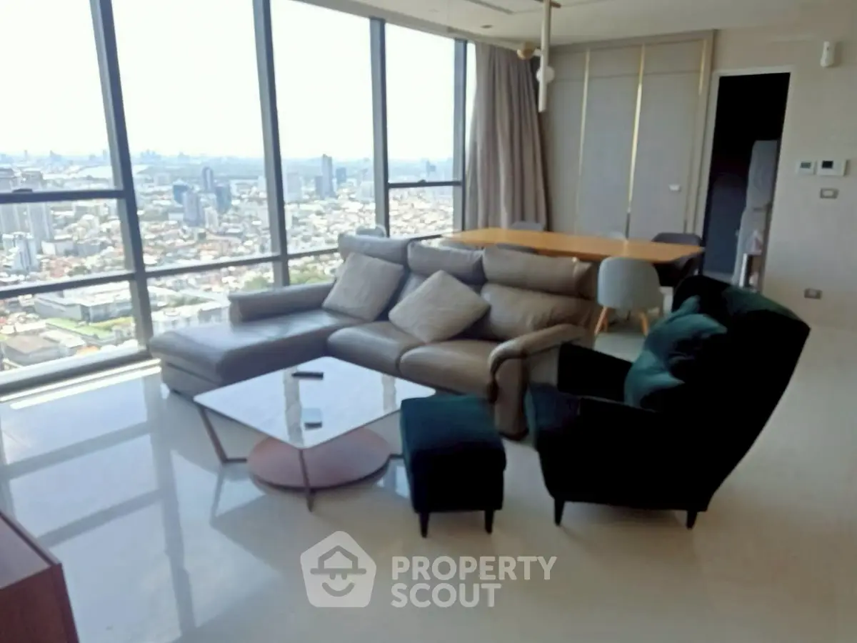 Luxurious living room with panoramic city view and modern furniture