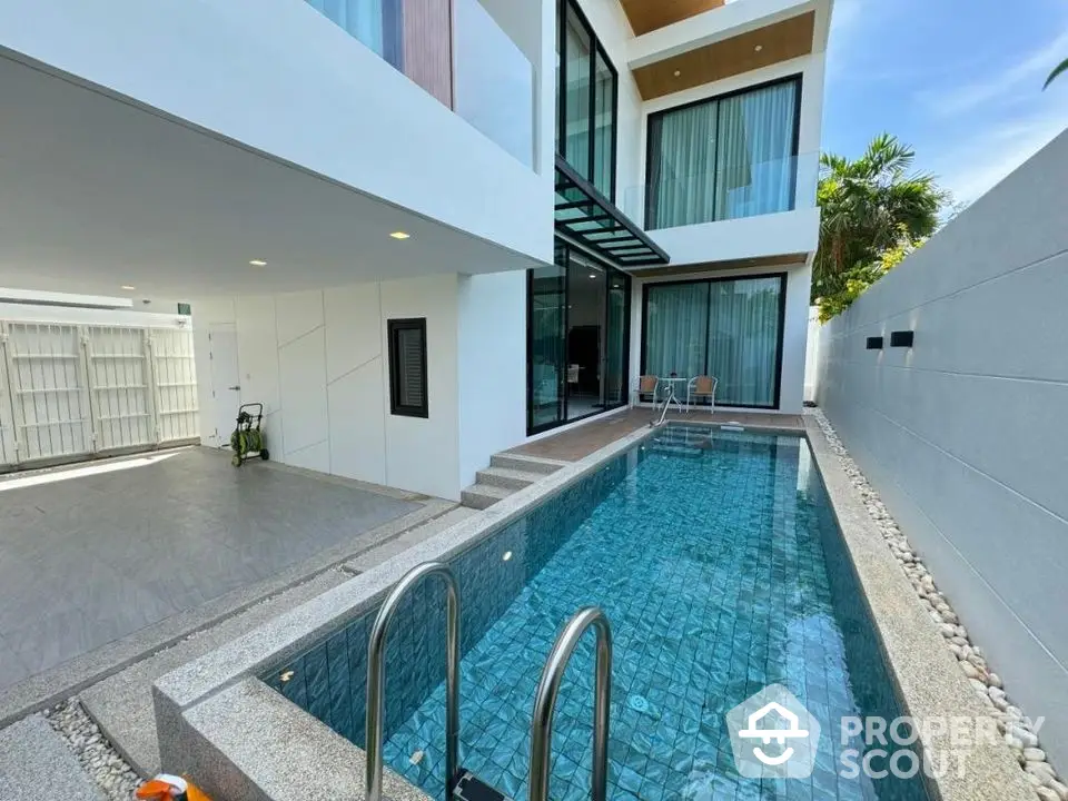 Modern luxury villa with private pool and spacious patio area