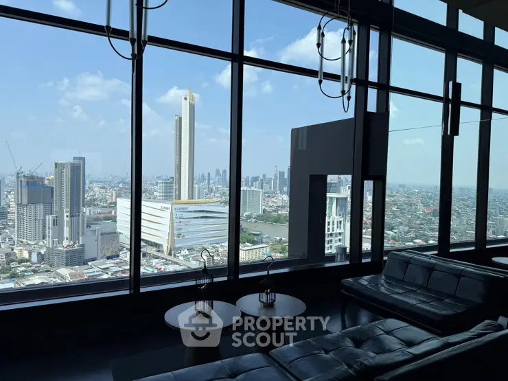 Luxurious high-rise apartment with stunning city skyline view and modern interior design.