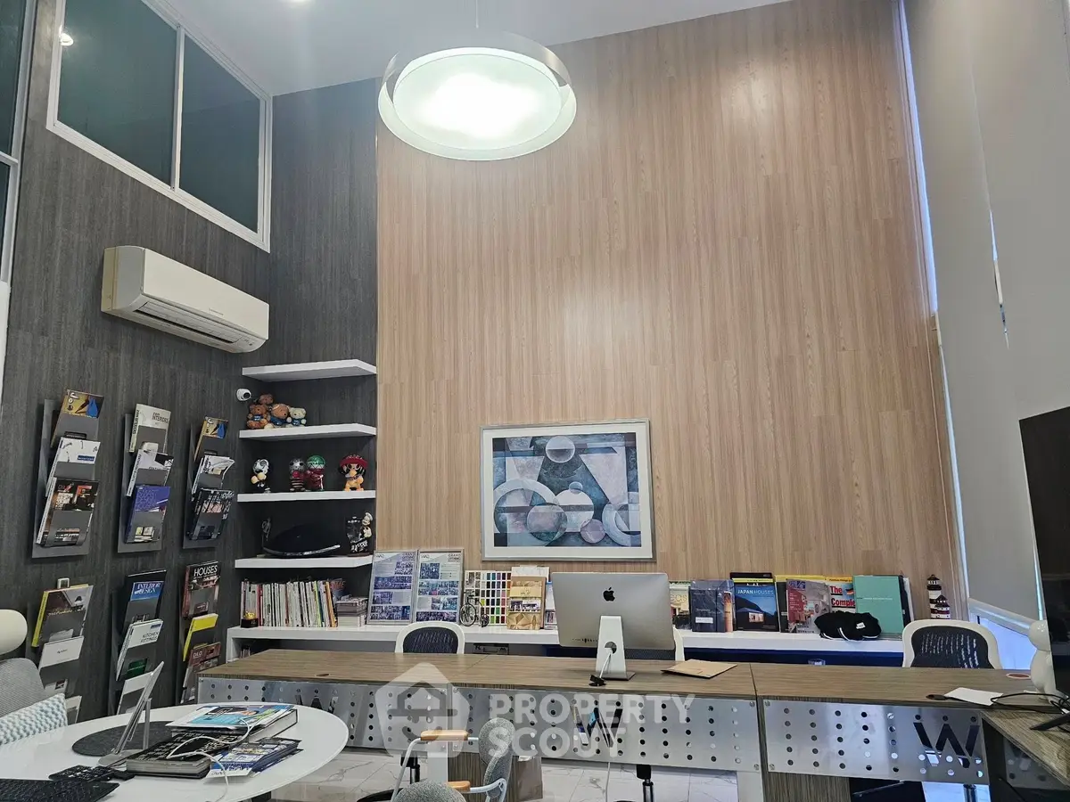Modern study room with high ceiling and stylish decor