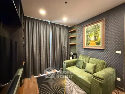 Cozy living room with elegant decor and plush green sofa