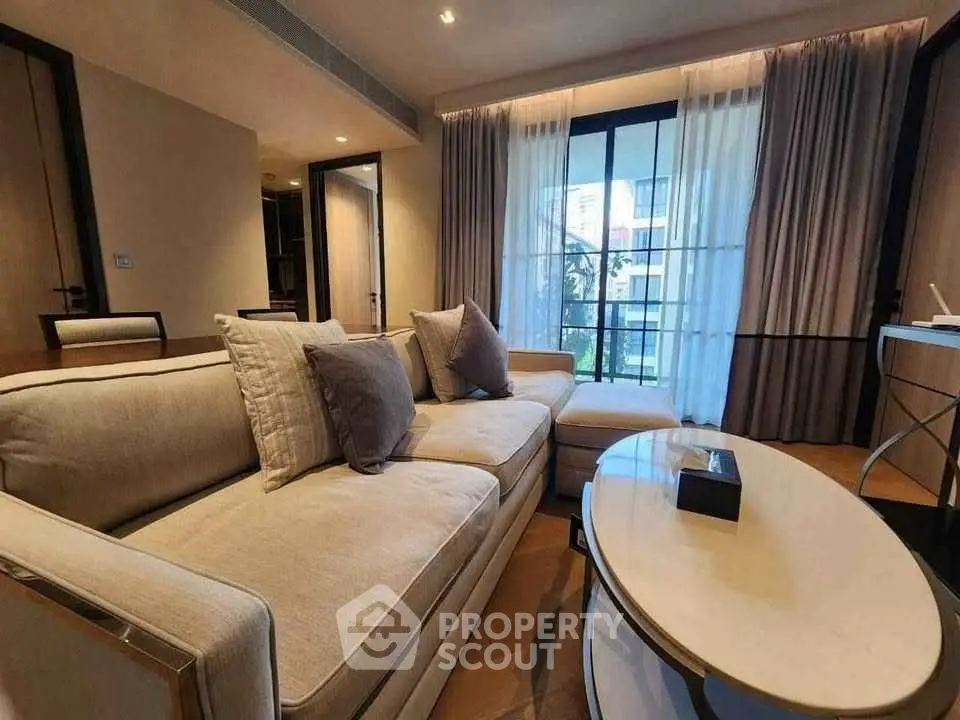 Luxurious living room with elegant sofa and modern decor, perfect for relaxation and entertainment.