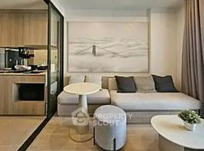 Modern living room with stylish furniture and open kitchen layout