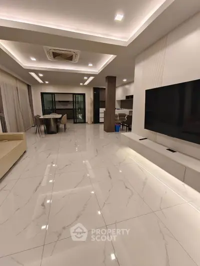 Luxurious modern living room with marble flooring and sleek design