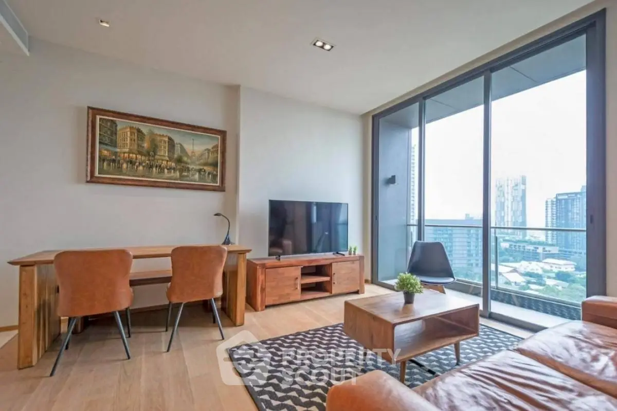 Modern living room with city view, stylish furniture, and large windows in urban apartment.