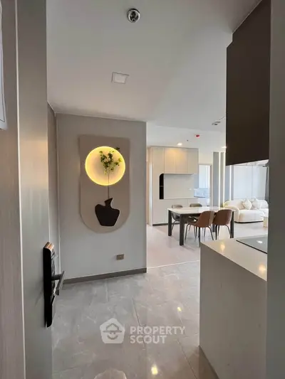 Modern open-layout living room with stylish decor and dining area