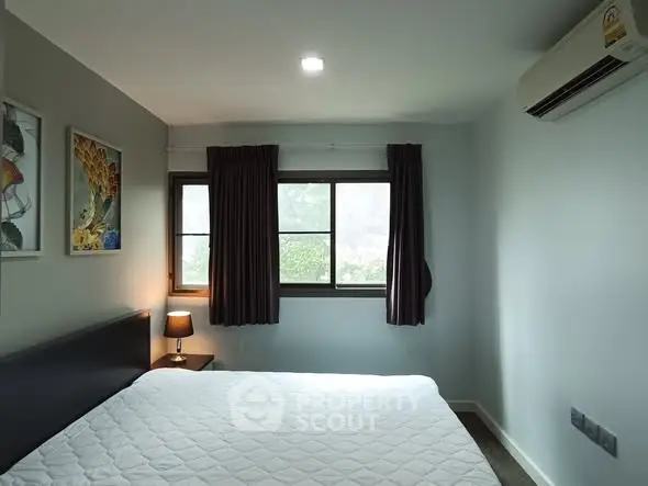 Cozy bedroom with modern decor and natural light