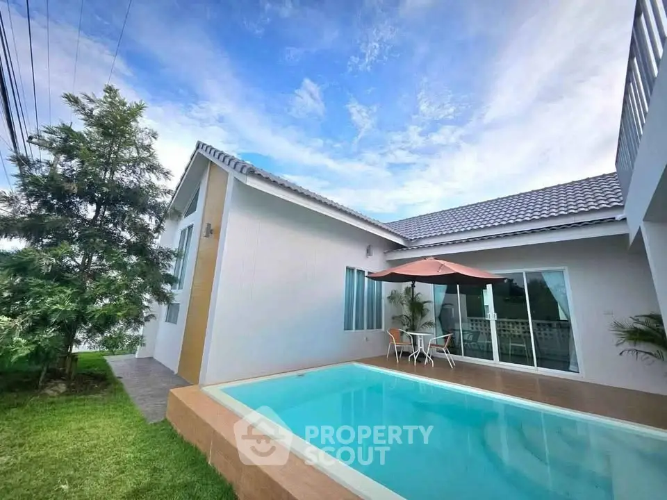 Stunning modern villa with private pool and lush garden, perfect for luxury living.