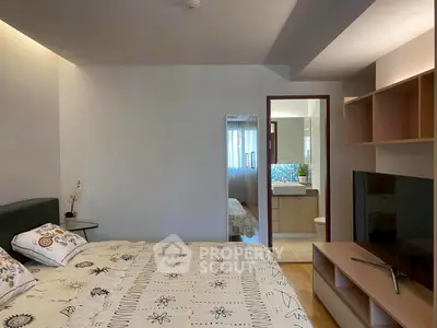 Modern bedroom with ensuite bathroom and stylish decor