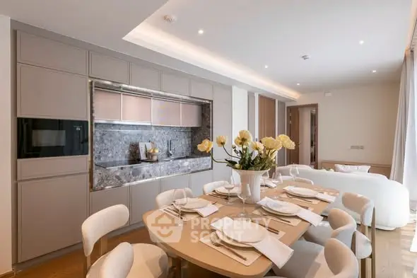 Elegant dining area with modern kitchen in luxury apartment