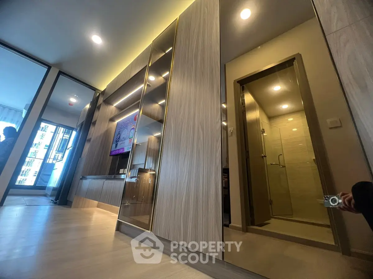 Modern apartment interior with sleek design and ample lighting