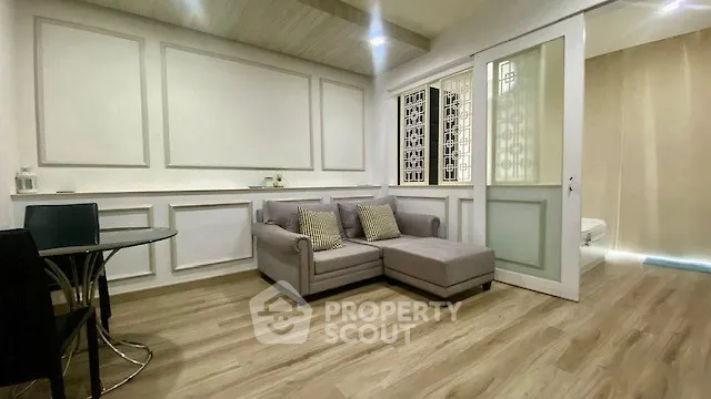 Stylish modern living room with elegant decor and cozy seating area