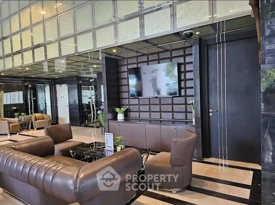 Luxurious modern living room with plush leather seating and sleek decor
