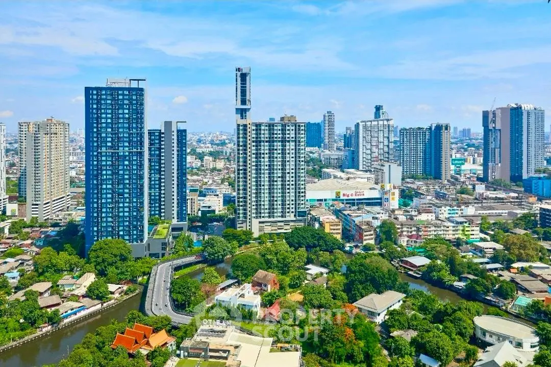Stunning cityscape view showcasing modern high-rise buildings and lush greenery in an urban setting.