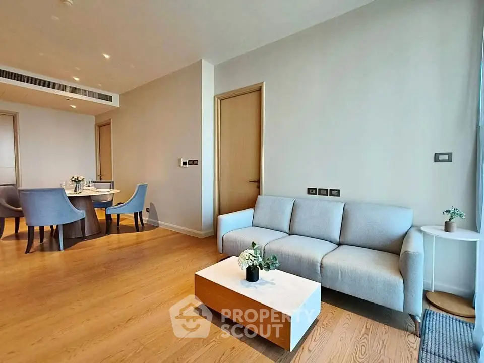 Modern living room with elegant dining area and stylish furniture