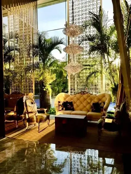 Luxurious living room with elegant decor and lush garden view