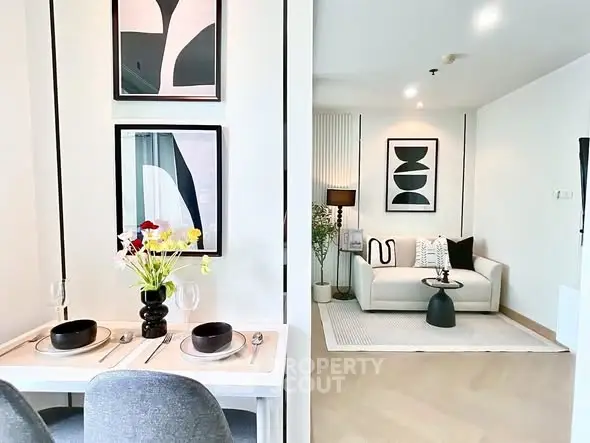 Modern living room with stylish decor and cozy dining area