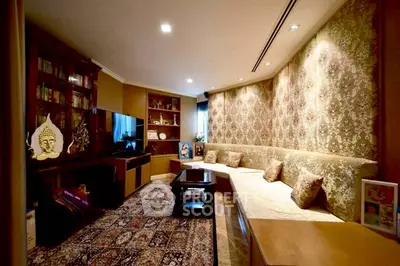 Luxurious living room with elegant decor and plush seating, perfect for relaxation and entertainment.