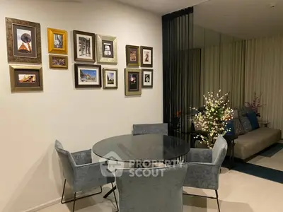 Stylish dining area with modern decor and cozy seating in a contemporary apartment.