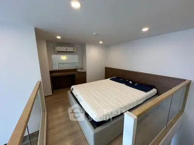 Modern bedroom with sleek design and cozy atmosphere in a stylish apartment.