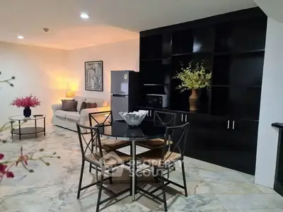 Spacious living room with modern dining area and elegant decor