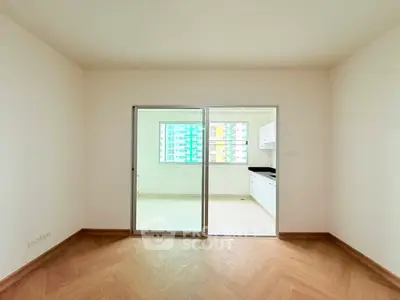 Spacious apartment with sliding glass doors and modern kitchen