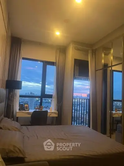 Luxurious bedroom with stunning city view and elegant decor