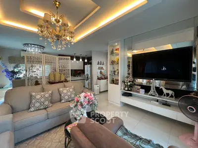 Luxurious living room with elegant chandelier and modern decor