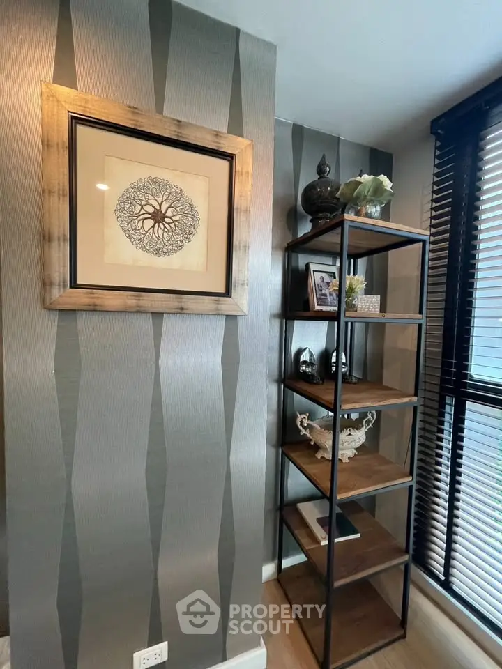 Stylish modern interior with elegant shelving and framed artwork, perfect for a contemporary living space.