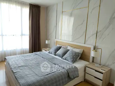 Luxurious bedroom with elegant marble accent wall and modern decor