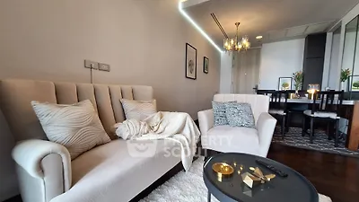 Elegant living room with modern decor and cozy seating area